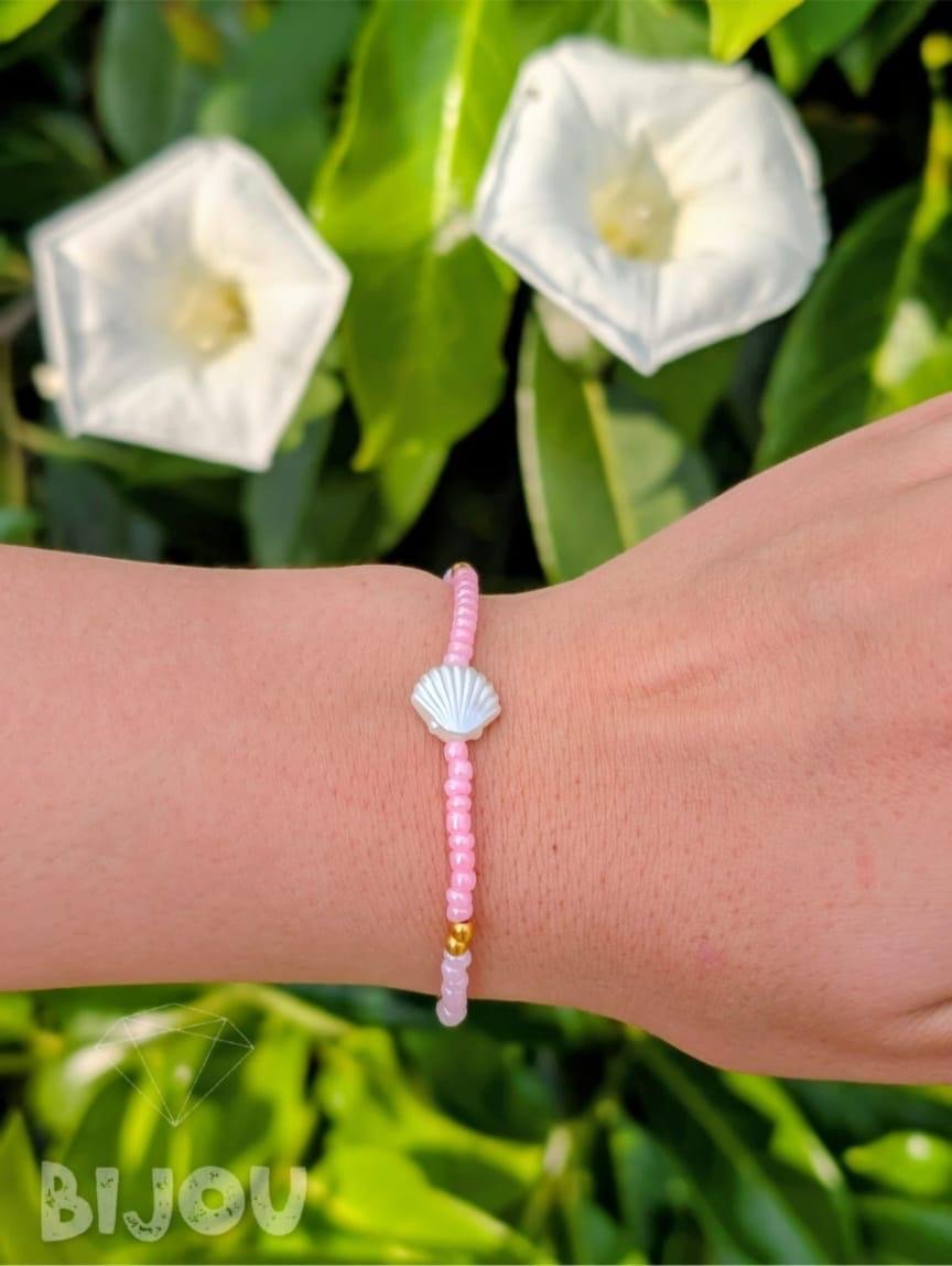 Pink seed beads with mother-of-pearl shell charm